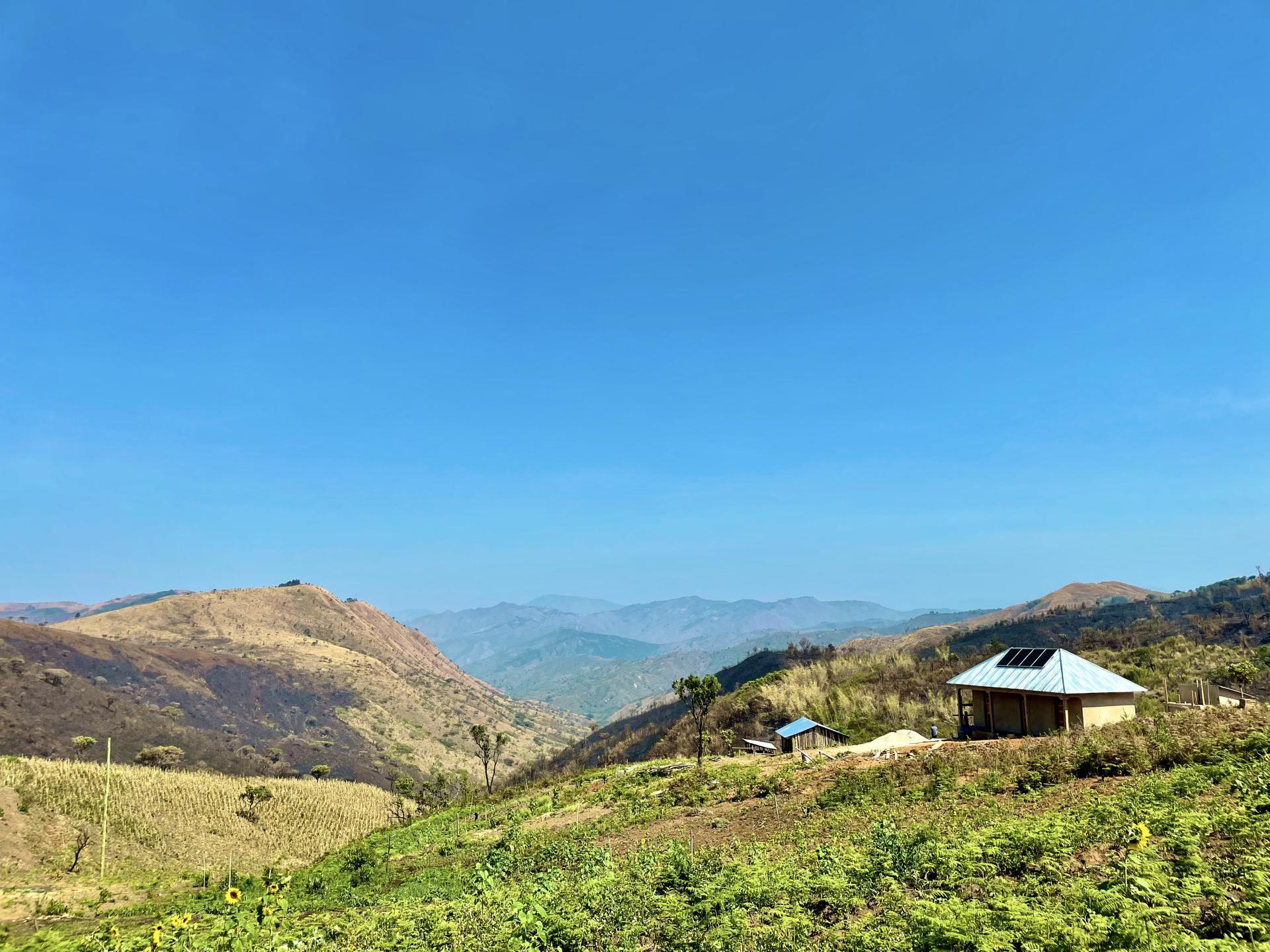 TZA_IOG31_View_over_camp_with_Dormitory_2022